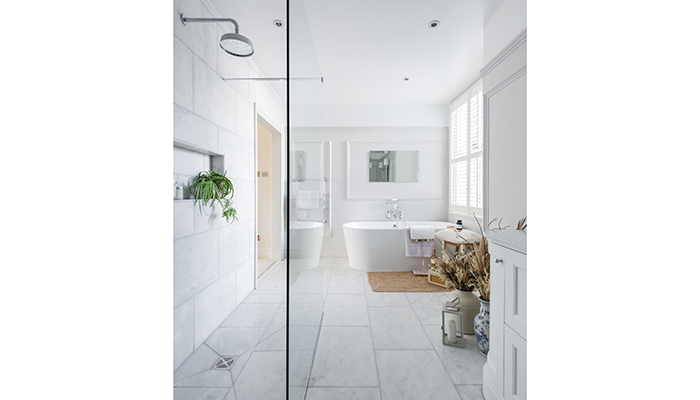 The proportions of the room allowed space for both a freestanding tub, and a generous showering area, complete with a View 20 walk-through fixed glass panel from The Shower Lab
