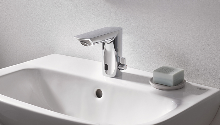 Grohe’s touch-free Bau Cosmo E infra-red taps are finished in StarLight chrome