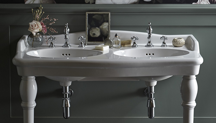 Featuring pretty vintage detailing, Heritage Bathrooms’ Victoria double console basin is made from white vitreous china with chrome bottle traps