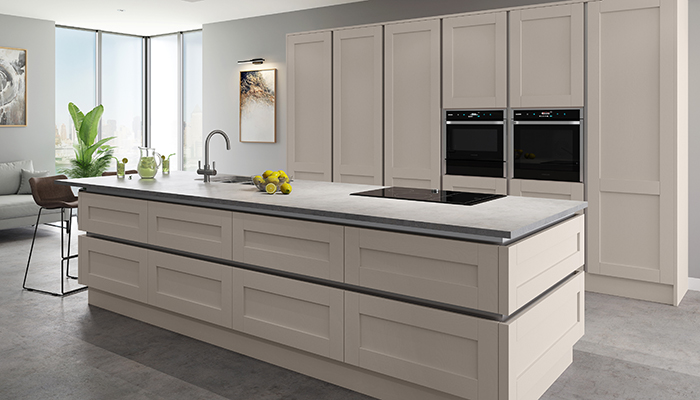Crown Imperial’s Midsomer oak Shaker kitchen, shown here in Cashmere, is now available in a handleless design