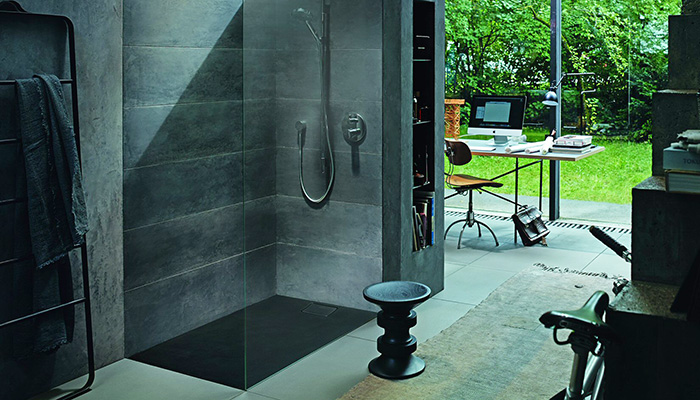 The matt surface of Duravit’s Stonetto shower tray offers the appearance of authentic stone – shown here in Anthracite, it also comes in White, Sand and Concrete