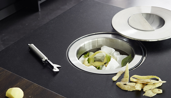 For a different approach Eggersmann’s Work food waste bin can be integrated into a kitchen island rather than under the sink