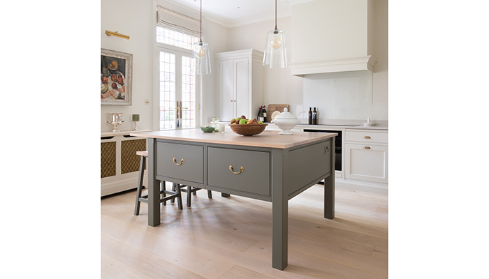 The central prep table is finished in H|M Lock & Load and features a classic oak worktop