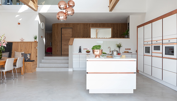 Shown here is the H Line Lumina White with copper tints by Masterclass Kitchens