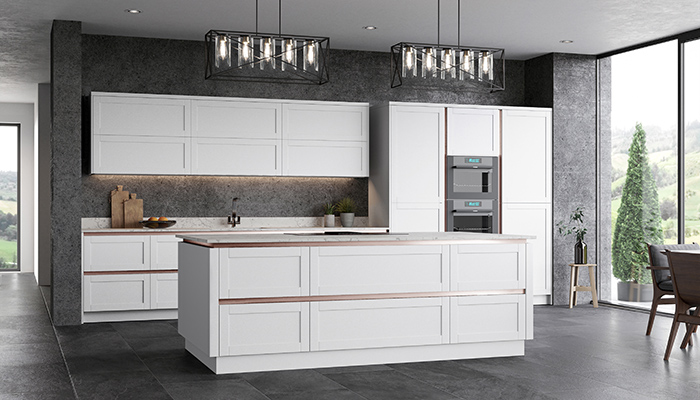 This is TKC’s Stratto White handleless kitchen with Rose Gold