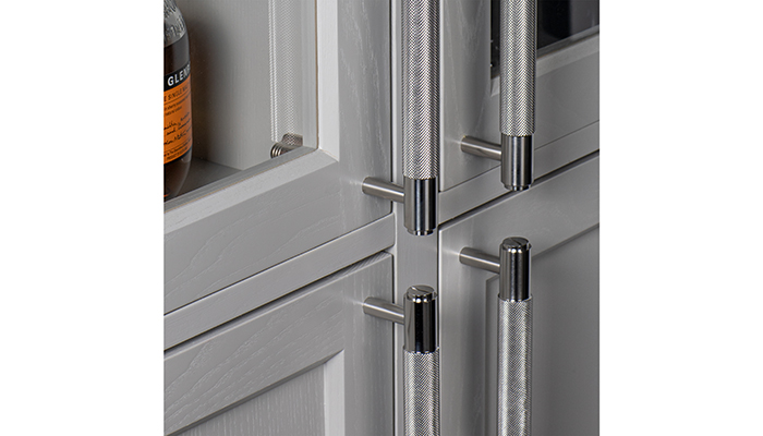 Close-up showing the knurled detail on steel cabinet pull handles