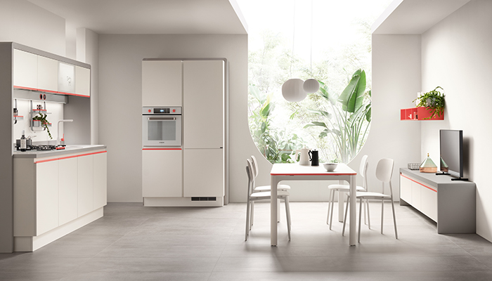 Dandy Plus kitchen in Pure White with Grey Plus bridge and Coral Red accents