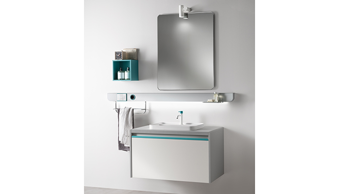 Here the Task Bar with smart speaker runs under the mirror with Agave Blue accents, which can also be seen on the Grey Plus vanity unit