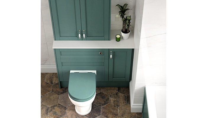 Here Utopia’s Roseberry painted timber furniture in Green conceals pipework and offers plenty of storage