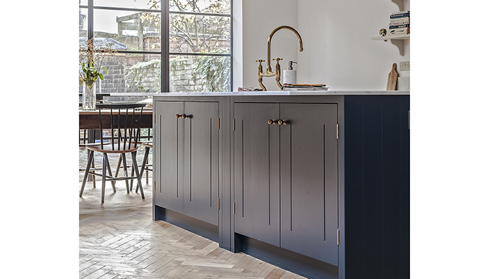 The scheme features cabinetry hand-painted in Farrow & Ball’s Hague Blue