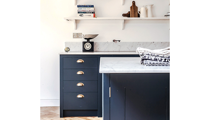 Karla advised the homeowners to adjust their design by increasing the depth of the marble worktops and creating higher upstands