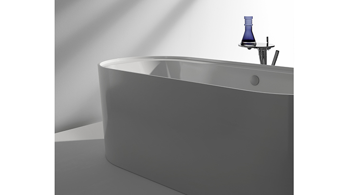 The Immerse bath is made from Marbond, and offers two installation choices – curved freestanding or corner back to wall