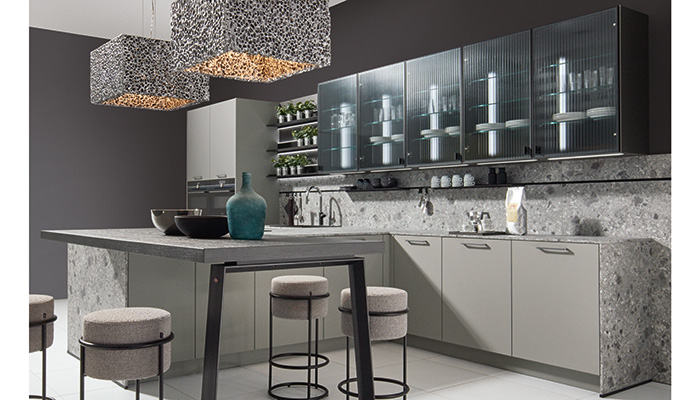 Pronorm kitchen in Platinum Grey Ultra Matt and Black Matt, with glass-fronted units on the far wall