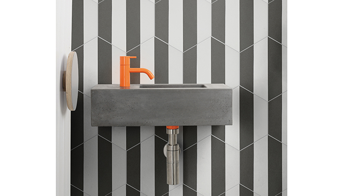 The Neapolitan Black Porcelain hexagonal tile from Ca’ Pietra can be used to create vertical stripes, chequerboard style or a zig-zag herringbone look, and also comes in Aqua, Blue, Pink or Yellow