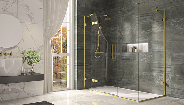 Merlyn’s Arysto shower enclosure in brushed brass with side panel