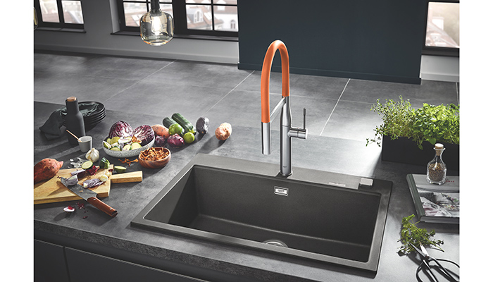 Grohe’s composite sink range, pictured with its Essence Professional kitchen tap, comes in dark tones with generous proportions