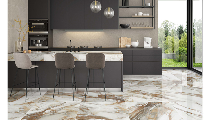Pamesa’s CR Arno Antic is a porcelain marble-effect tile mixing ochre with white and available in five formats