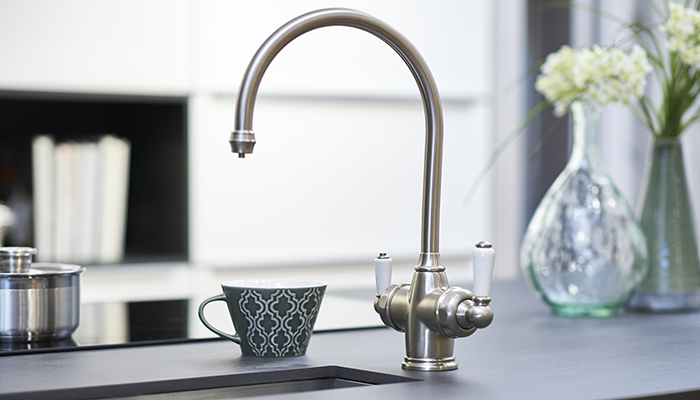 Perrin & Rowe's Polaris 3-in-1 instant hot tap is shown here in a striking Pewter finish