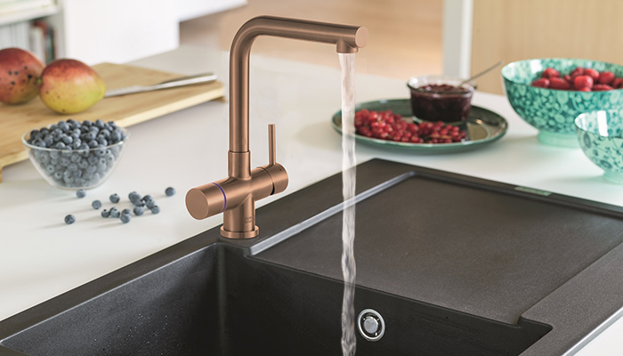 Franke's Minerva 4-in-1 electronic tap is shown here in the new Copper finish