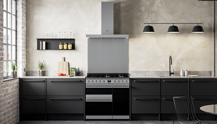 Smeg’s relaunched Symphony range cooker with new Eclipse black glass doors, full length handles and towel rail