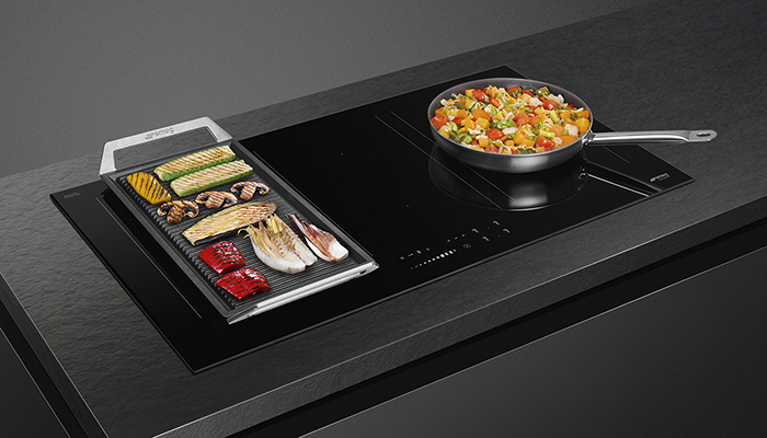 Smeg’s new Eclipse glass induction hob, shown here in 90cm model, with glass designed to match Smeg’s Dolce Stil Novo and Classic built-in design families