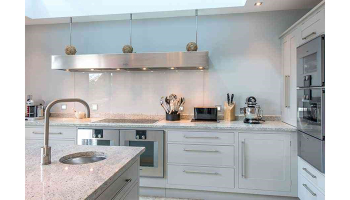 Contemporary-style hood in a kitchen project by Bryan Turner Kitchens