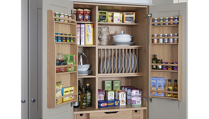 Crown Imperial’s Pantry – shown here from the Midsomer Oak Shaker collection – includes spice pull-outs, wine and plate racks, door storage and soft-close drawers