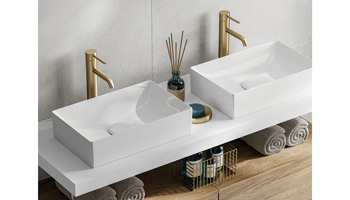 Brushed brass is the perfect finish for the Atlas Mono basin mixer from HiB, shown here alongside its Harley basins