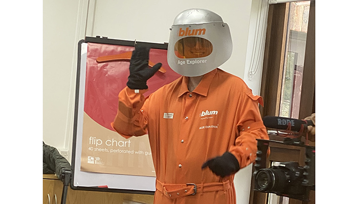 Third-year student Liam Butler of Butler Interiors, Lancashire, wears an Age Explorer suit, as part of a talk by Blum on R&D