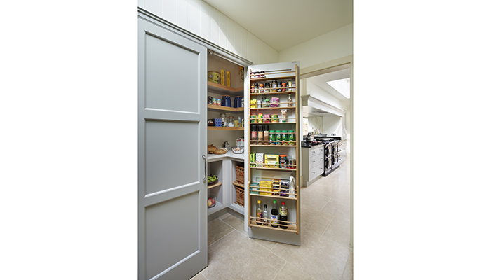 This walk-in pantry was fitted out in close consultation with the clients, based on their shopping habits, the ingredients they like to keep handy and their preferred way of storing everything from bread to vegetables. Cabinetry is Martin Moore’s New Classic collection painted in Soft Grey