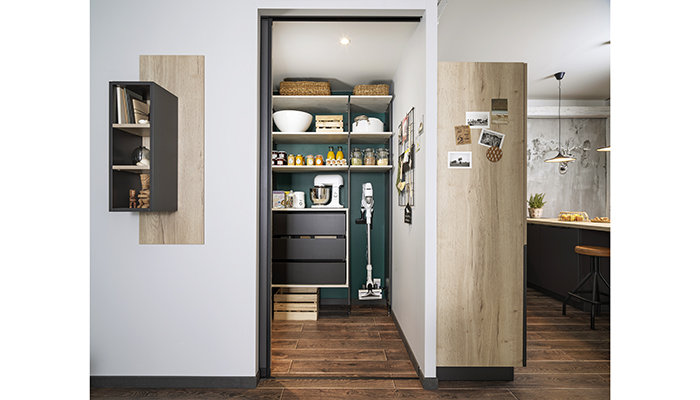 A made-to-measure pantry is the ultimate in organisation for those that have the space. This design by Schmidt, available in a choice of 10 colours, incorporates drawers to hide clutter, height adjustable shelves and hanging space for large items such as the vacuum cleaner