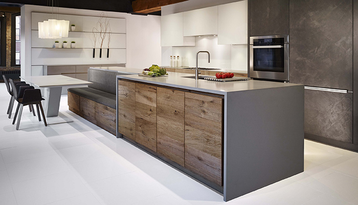 For a client who wants to achieve a similar look, this Eggersmann kitchen features Chablis Vintage Oak embossed wood veneer on the island