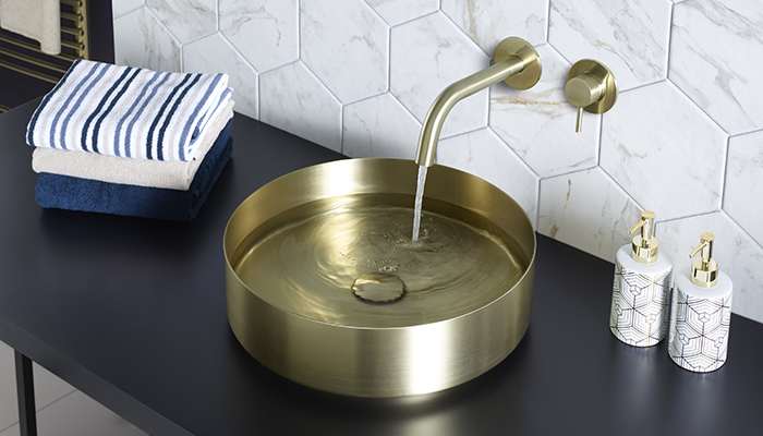 VOS single lever wall mounted basin mixer and countertop basin, both in brushed brass finish