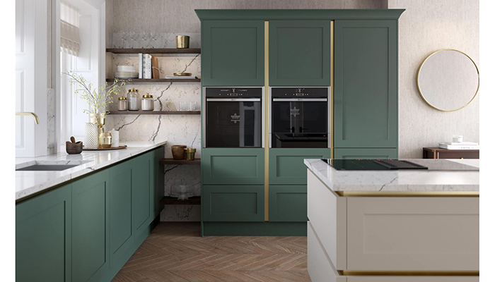 Shaker style is given a modern twist with PWS’s handleless doors. Striking Copse Green is paired here with muted Cashmere for a sophisticated look, with a complementing trim for a touch of luxury