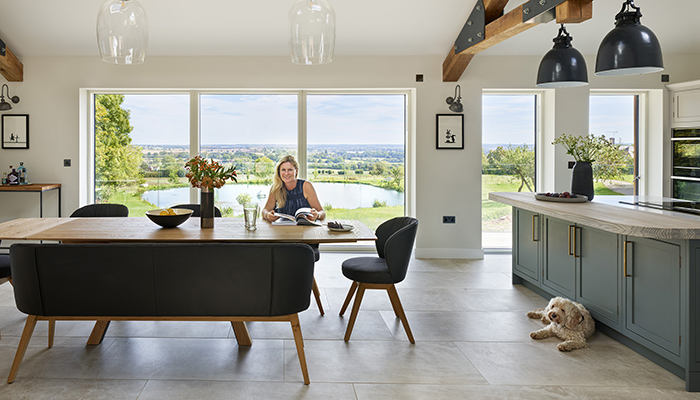 Sarah in her finished kitchen