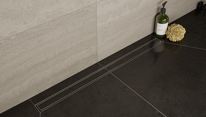 Designers can create a sleek and sophisticated finish with Impey’s Gravity linear wetroom waste, which has the option to include a tiled insert