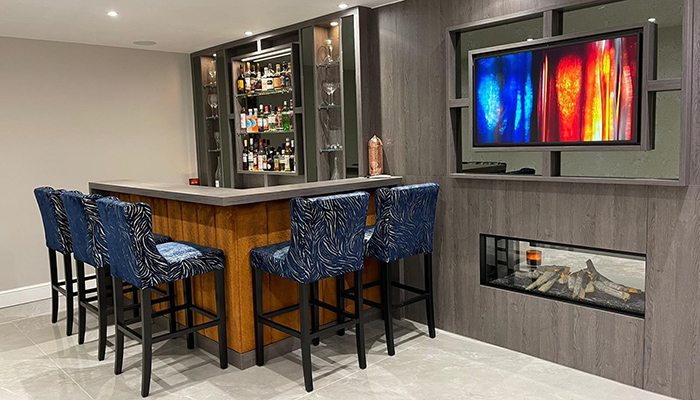 This bar project by Brandt Design features the Urban Furniture range with handleless slab door fronts, along with a Siemens fridge and Caple wine cooler