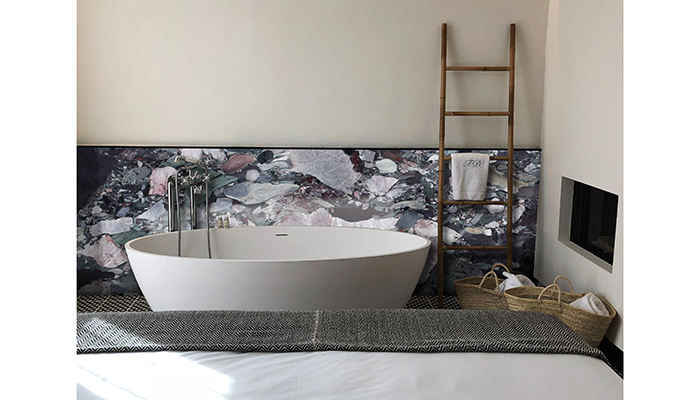 Clients can add an impressive backdrop to their bathing space with Opera d’Arte, an exotic marble from Cullifords. Sourced from France, this pattern-filled surface has an exquisite depth of colour and detail, from a deep intense violet shade to a lighter lilac and hints of green