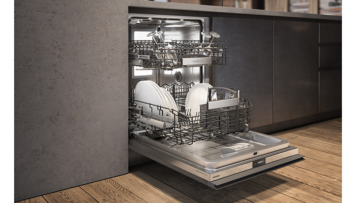 Gaggenau’s 400 series DF481 built-in dishwasher uses low-temperature drying with Zeolite to protect delicate glassware and can be controlled remotely through the Home Connect app. It holds up to 12 place settings and has eight programmes and four options while the push-to-open function makes this model ideal for sleek, handleless kitchens