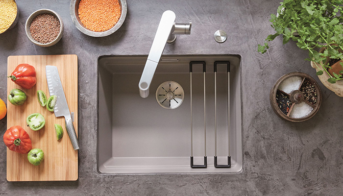 Etagon sink, available in 10 Silgranit colours, with additional ledge inside the bowl for slotting in a pair of heat resistant rails to rest pots and pans or chopping boards and colanders