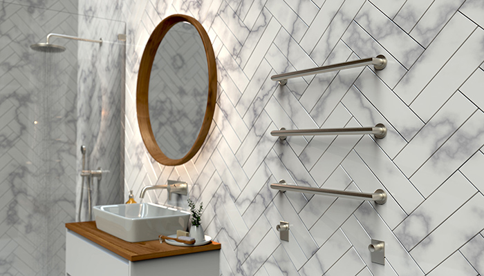 The FloBar collection by Vogue UK allows all plumbing to be hidden from view within the wall, making the FloBars themselves the main feature. FloBar Form can be specified in either a 500mm or 600mm width, and configured to suit the client, in a freestyle or ordered display of up to five bars. The three bar arrangement shown here in Brushed Stainless offers a heat output of 72 watts or 246 BTU 