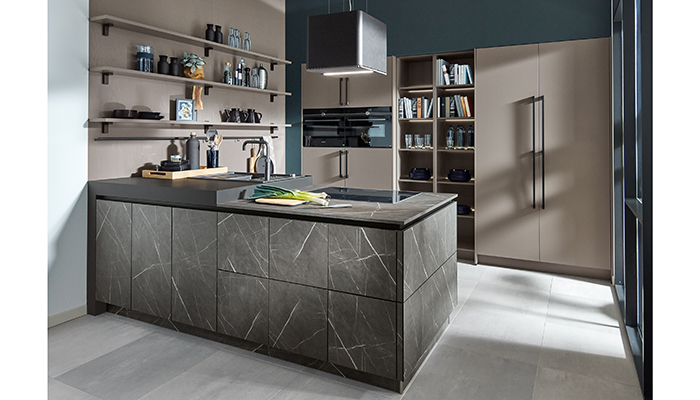 Inspired by natural materials and organic colours, Pronorm’s grey Marble Terramo laminate is teamed with Agate Grey ultra matt doors in this design featuring furniture from the Proline 128 and X-Line ranges