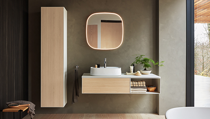 Designed by Sebastian Herkner, Duravit’s new Zencha collection was inspired by Japanese rituals and craftsmanship. Seen here in a Natural Oak finish, the wall-mounted vanity unit and tall cabinet have a delicate, 6mm frame which enhances the furniture’s light, minimalist look  