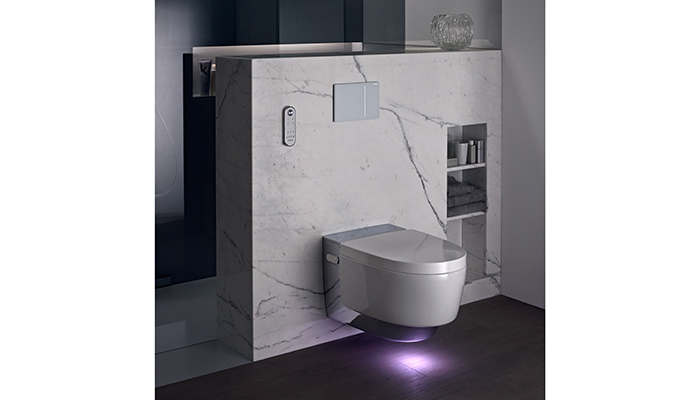 Additions such as Geberit’s Sigma70 white glass flush plate, shown here with the AquaClean Mera Comfort White Alpine WC with subtle positional lighting underneath, can further enhance a lighting scheme, while also offering a practical purpose. The flushing mechanism is activated by the wave of a hand, resulting in illuminated light fields which can be set in one of two different colours