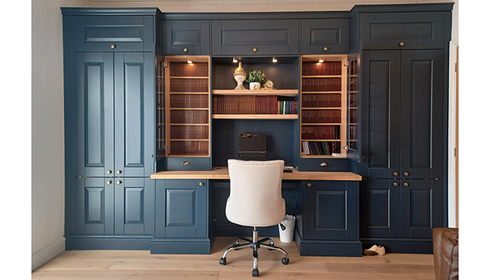 Clients can seamlessly co-ordinate office and kitchen furniture with Masterclass Kitchens’ Shaker-style Carnegie furniture. It is pictured in Oxford Blue with Portland Oak cabinetry and Torus plinth