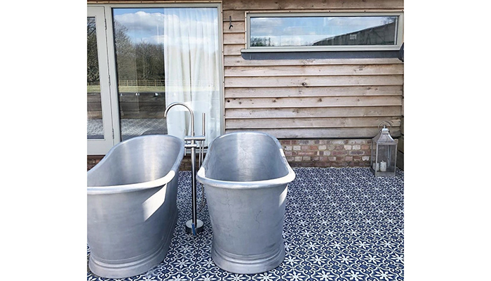 Shown here at the countryside home of @leannechandler, BC Designs’ Tin Boat Bath is suitable for use outside and creates an even bigger impact as a pair