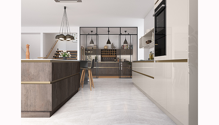 A second kitchen can also be a neat way for customers to take their kitchen from day to night. This project by Masterclass Kitchens features a dedicated drinks kitchen behind sleek, transparent doors. H Line Madoc Urban Suede and Lumina Highland Stone with Bronze handle rails are used in both areas for continuity