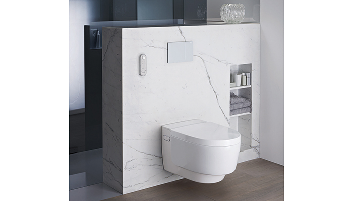 The Geberit AquaClean Mera Comfort, White Alpine, with Sigma70 flush plate with white glass