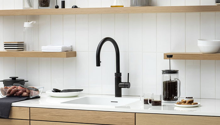 The Flex in Matt Black finish dispenses boiling, hot and cold water and has a flexible pull out hose