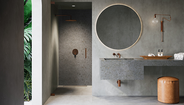 Prima in Antique Brushed Copper finish with shower wall and basin in MDi Meterora Gris, floors and walls in Ceralsio Cosmopolitan Grey